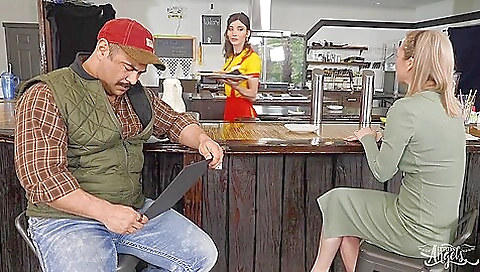 Brunette waitresses fucking with a cock in front of the camera