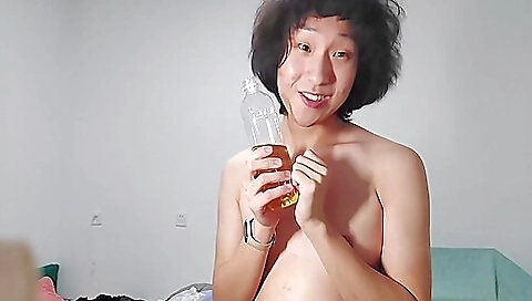Asian teen is getting her ass penetrated by a big cock
