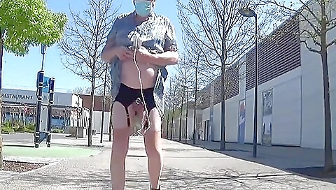 Travesti in sexy clothes is showing off her big tits